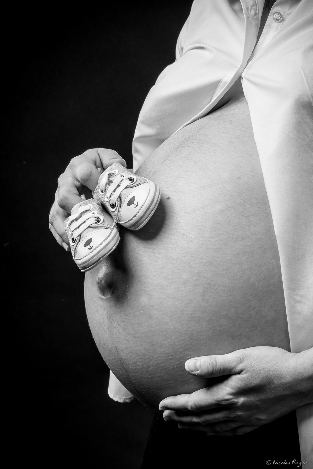 Photographie de grossesse et accessoire.